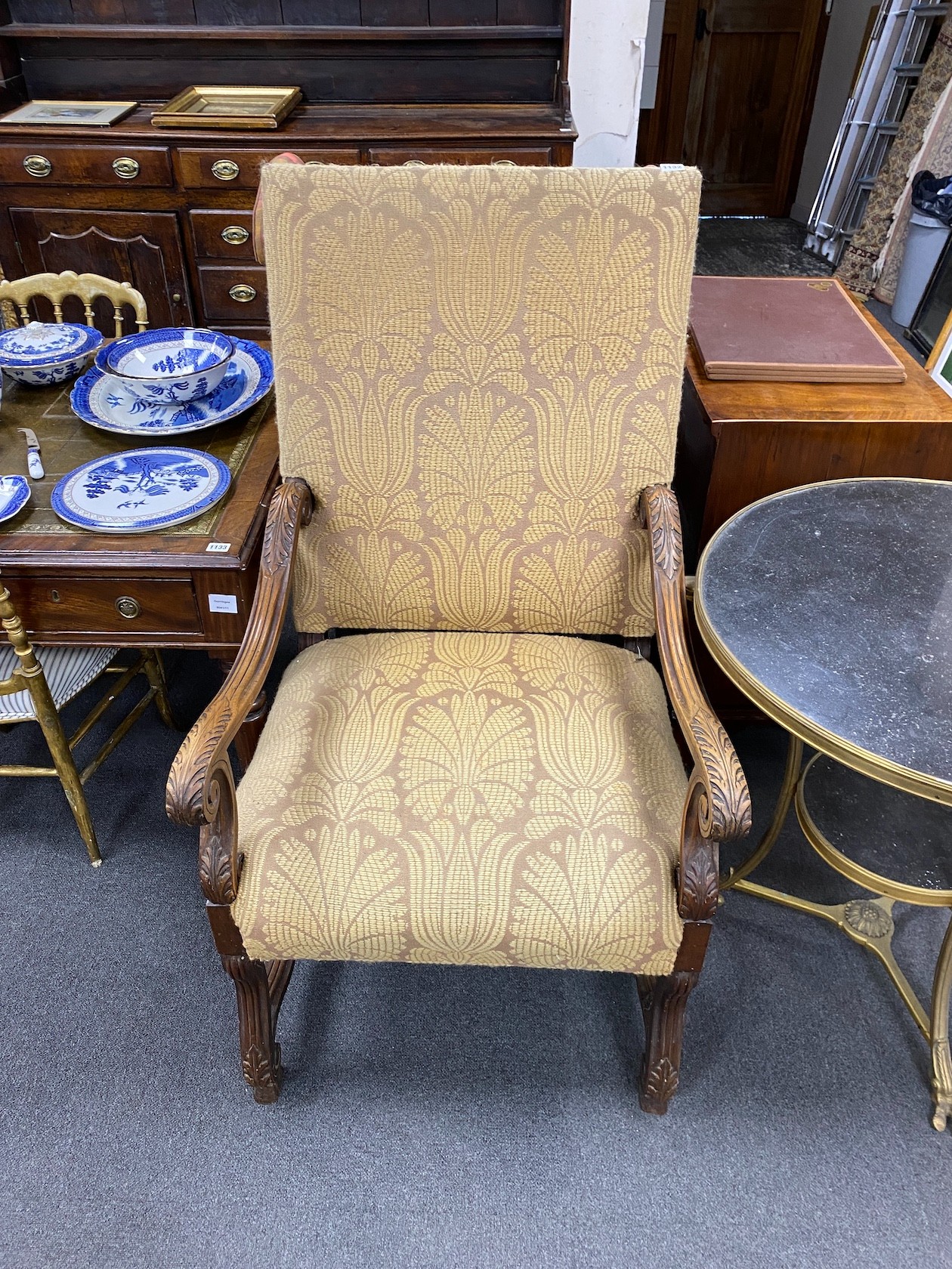 A Louis XIV style carved walnut framed fauteuil, width 65cm, depth 60cm, height 120cm